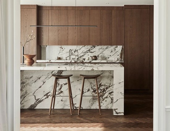 Natural Wood Kitchen cabinets with Marble Island and Fluid L-Shaped Layout